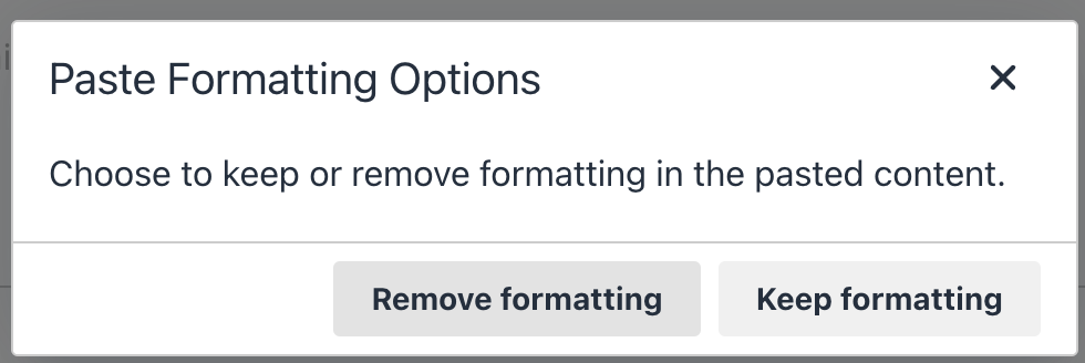 an image of the popup you will receive after copying and pasting content into the Text Editor. This popup allows you to select either keep or remove formatting.